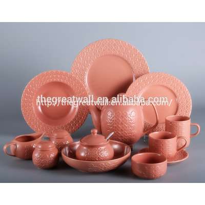 Eco-friendly 47pcs relief round orange red glazed stoneware dining table set for 6 people in stock